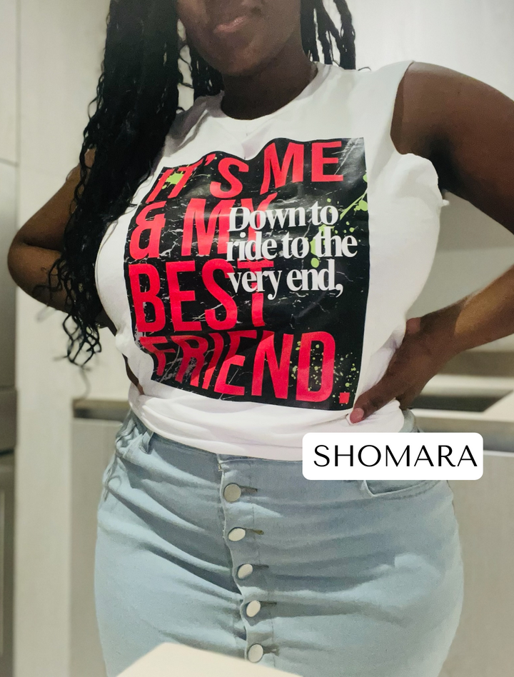 Close-up of Shomara wearing the "Down to Ride" T-shirt by Dass My Best Friend, showcasing the bold front design. The feminine-fitted tee highlights the playful and adventurous spirit of best friends.